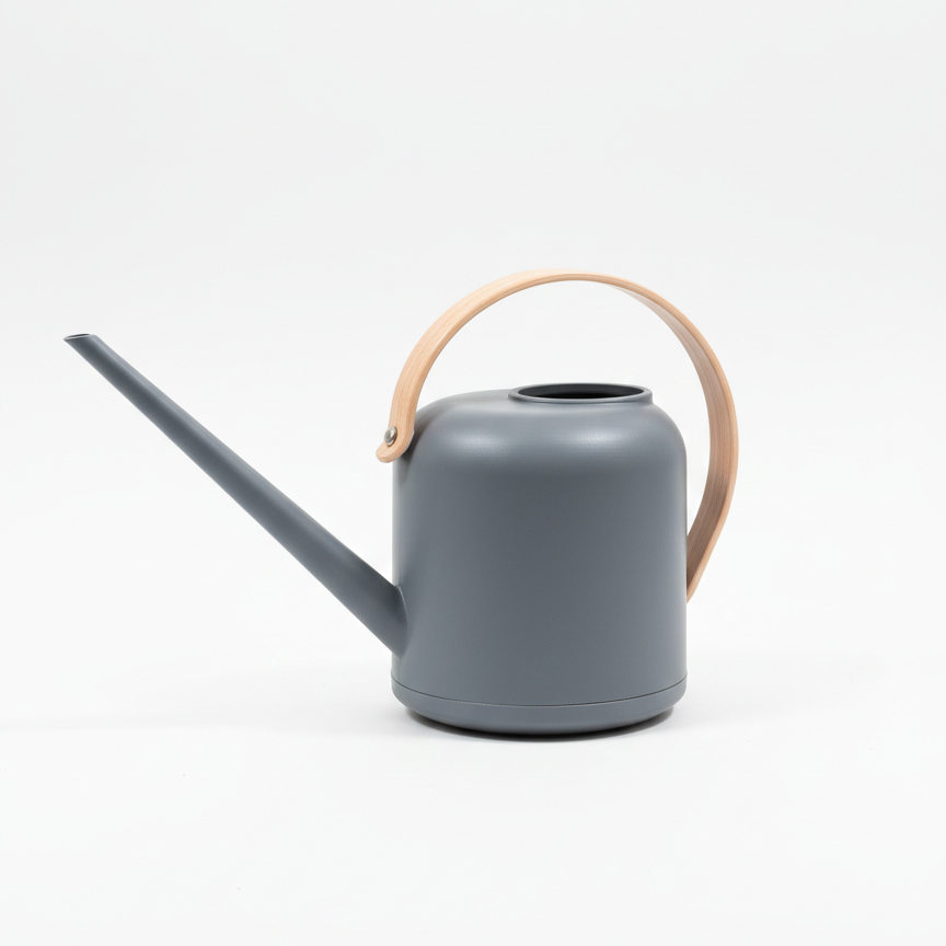 : Photo de produit sur fond blanc montrant l'arrosoir de profil. On distingue clairement le long bec verseur de précision et la poignée ergonomique en plastique clair.