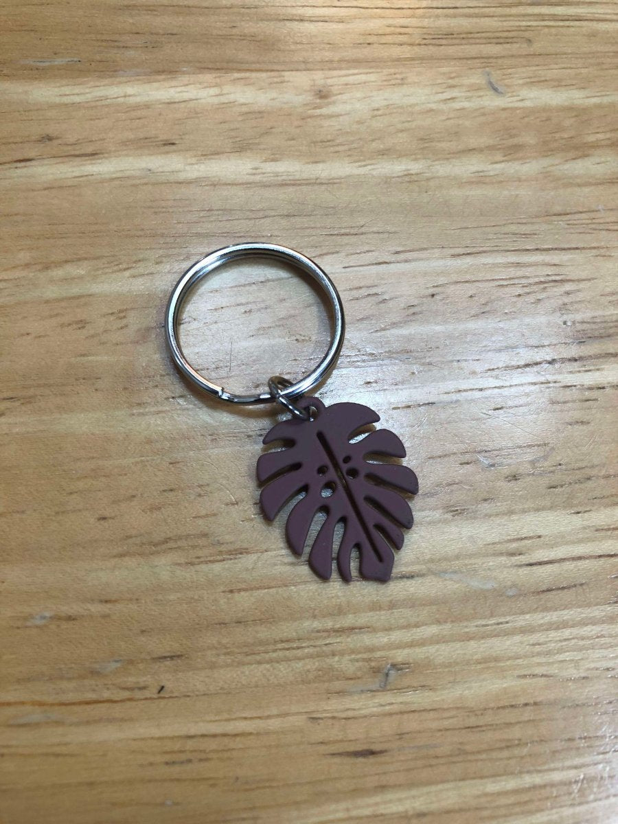 pendentif en forme de feuille de monstera violet